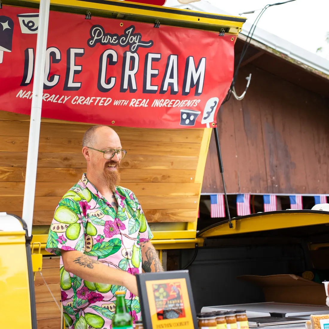 A local ice cream maker greeting festival guests